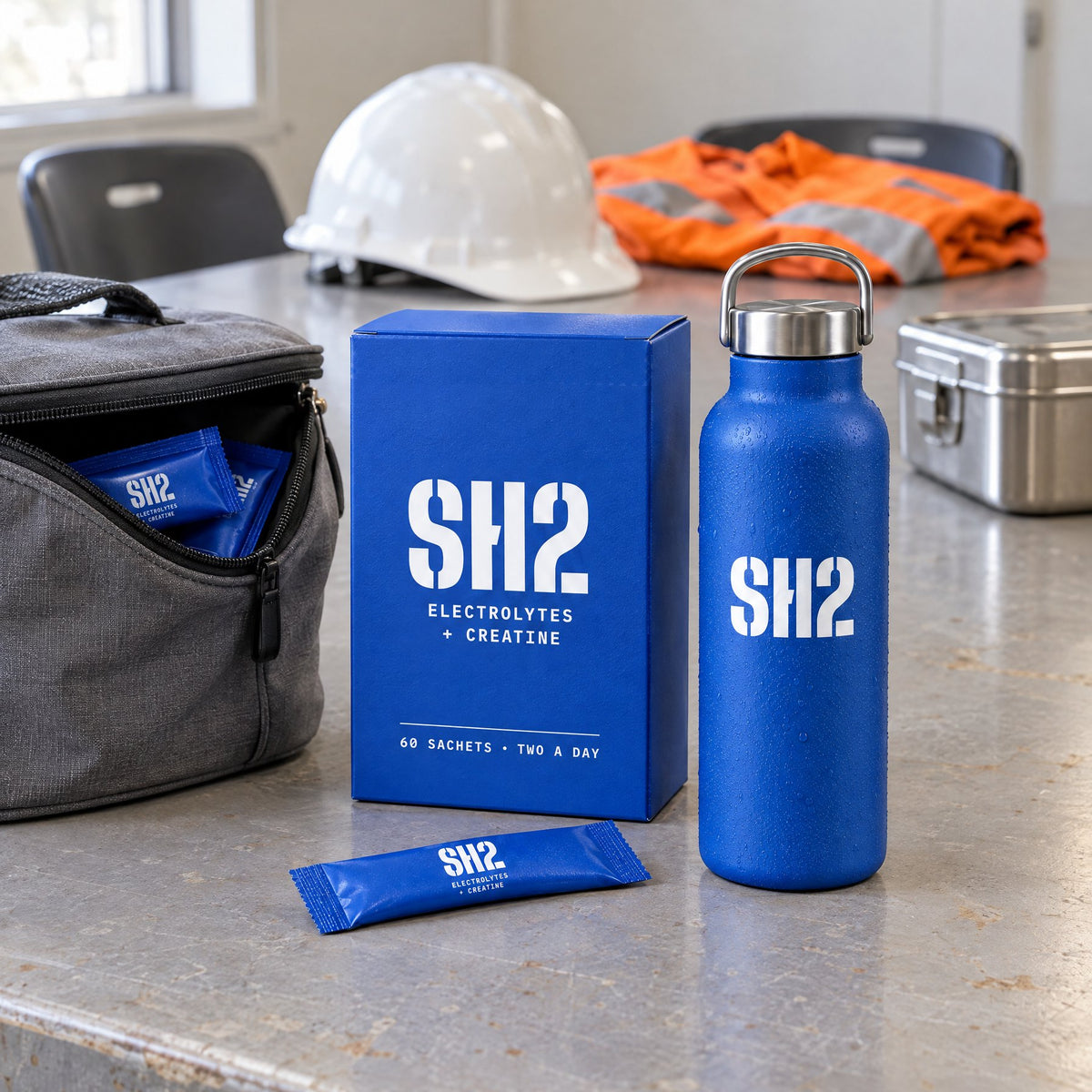 SH2 box, bottle and sachets on a crib-room table at smoko