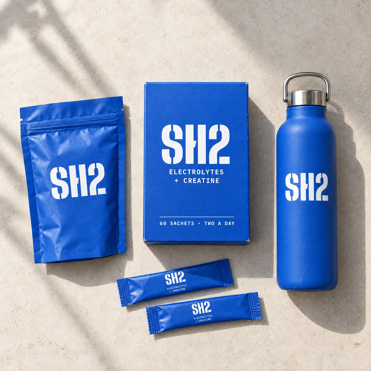 SH2 starter kit from above: zip pouch, box, bottle and two sachets